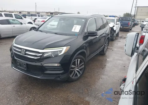 2018 Honda Pilot Touring z USA, uszkodzony, nr VIN 5FNYF5H99JB017044